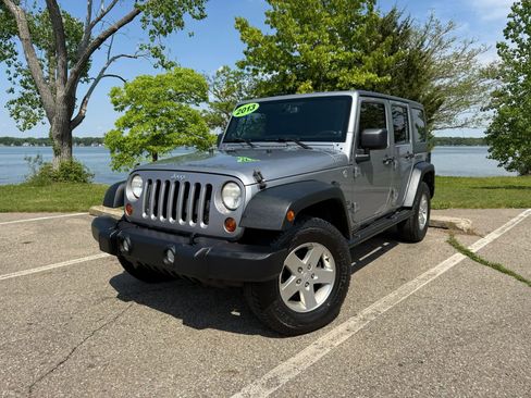 Used 2013 Jeep Wrangler Unlimited Sport AWD/4WD image 1