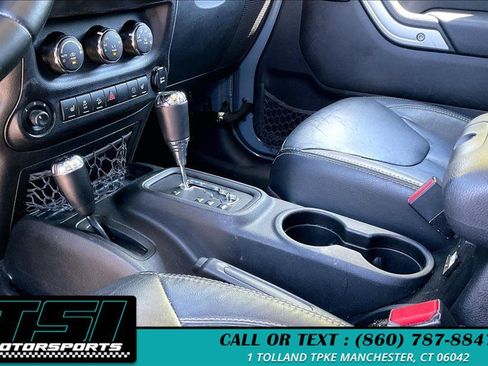 Used 2014 Jeep Wrangler Unlimited Sahara w/ Dual Top Group AWD/4WD image 13