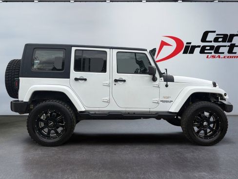Used 2013 Jeep Wrangler Unlimited Sahara w/ Dual Top Group image 11