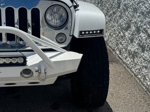 Used 2014 Jeep Wrangler Unlimited Sahara w/ Mopar Chrome Edition Group AWD/4WD image 8