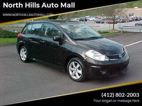 Used 2011 Nissan Versa SL w/ Premium Pkg image 1