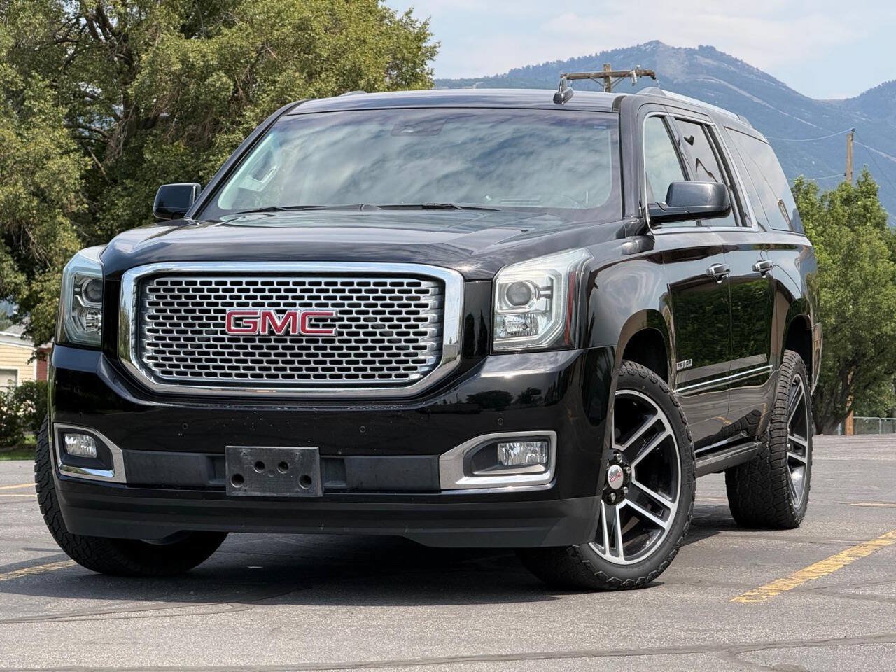 Used 2016 GMC Yukon XL Denali w/ Enhanced Security Package AWD/4WD image 1