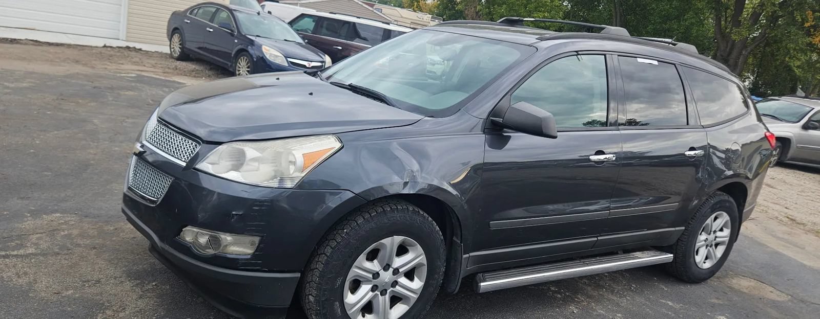Used 2012 Chevrolet Traverse LS w/ LPO, 'HIT The Road' Package FWD image 1