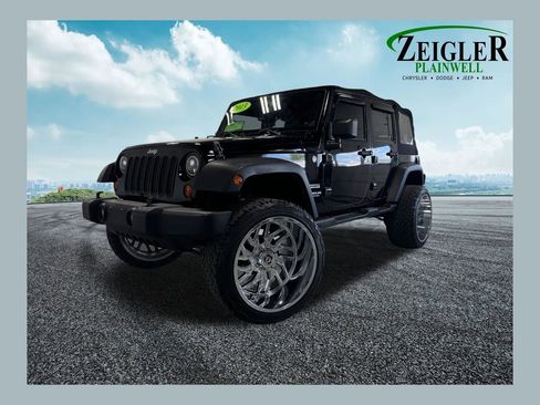 Used 2013 Jeep Wrangler Unlimited Sport AWD/4WD image 1