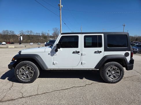 Used 2013 Jeep Wrangler Unlimited Sport image 1
