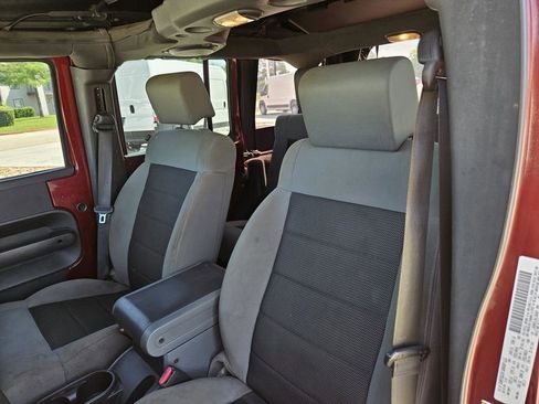 Used 2010 Jeep Wrangler Unlimited Sahara w/ Dual Top Group AWD/4WD image 12