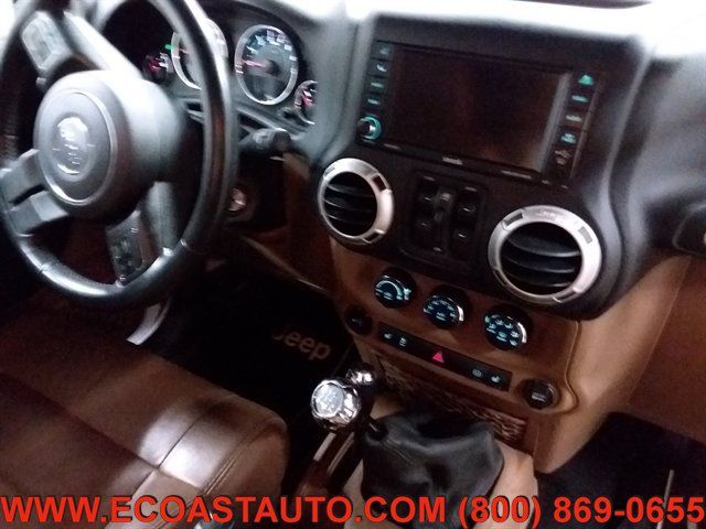 Used 2012 Jeep Wrangler Unlimited Sahara w/ Dual Top Group AWD/4WD image 14