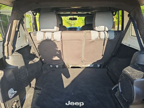 Used 2013 Jeep Wrangler Unlimited Sahara w/ Dual Top Group AWD/4WD image 12