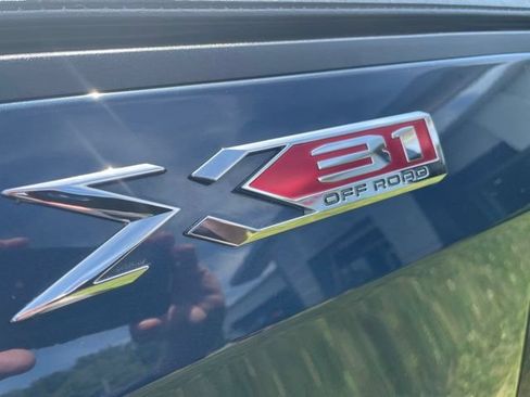 Used 2021 GMC Sierra 1500 SLT w/ SLT Premium Package AWD/4WD image 4