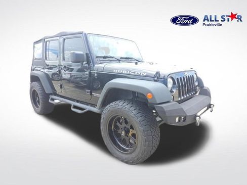 Used 2014 Jeep Wrangler Unlimited Rubicon w/ Connectivity Group AWD/4WD image 1