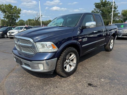 Used 2014 RAM 1500 Laramie AWD/4WD image 1