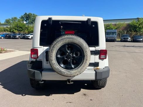 Used 2014 Jeep Wrangler Unlimited Sahara w/ Dual Top Group AWD/4WD image 6