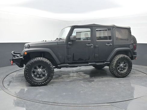 Used 2012 Jeep Wrangler Unlimited Sahara AWD/4WD image 2