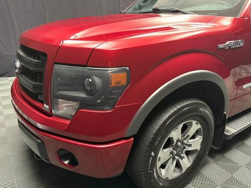Used 2014 Ford F150 FX4 Pickup 4D 6 1/2 ft w/ Equipment Group 402A Luxury AWD/4WD image 8