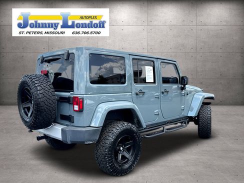 Used 2014 Jeep Wrangler Unlimited Sahara w/ Dual Top Group AWD/4WD image 2