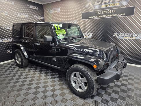 Used 2012 Jeep Wrangler Unlimited Rubicon w/ Dual Top Group AWD/4WD image 8