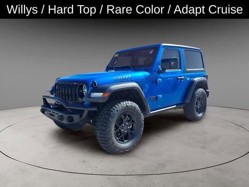 Used 2025 Jeep Wrangler Sport image 1