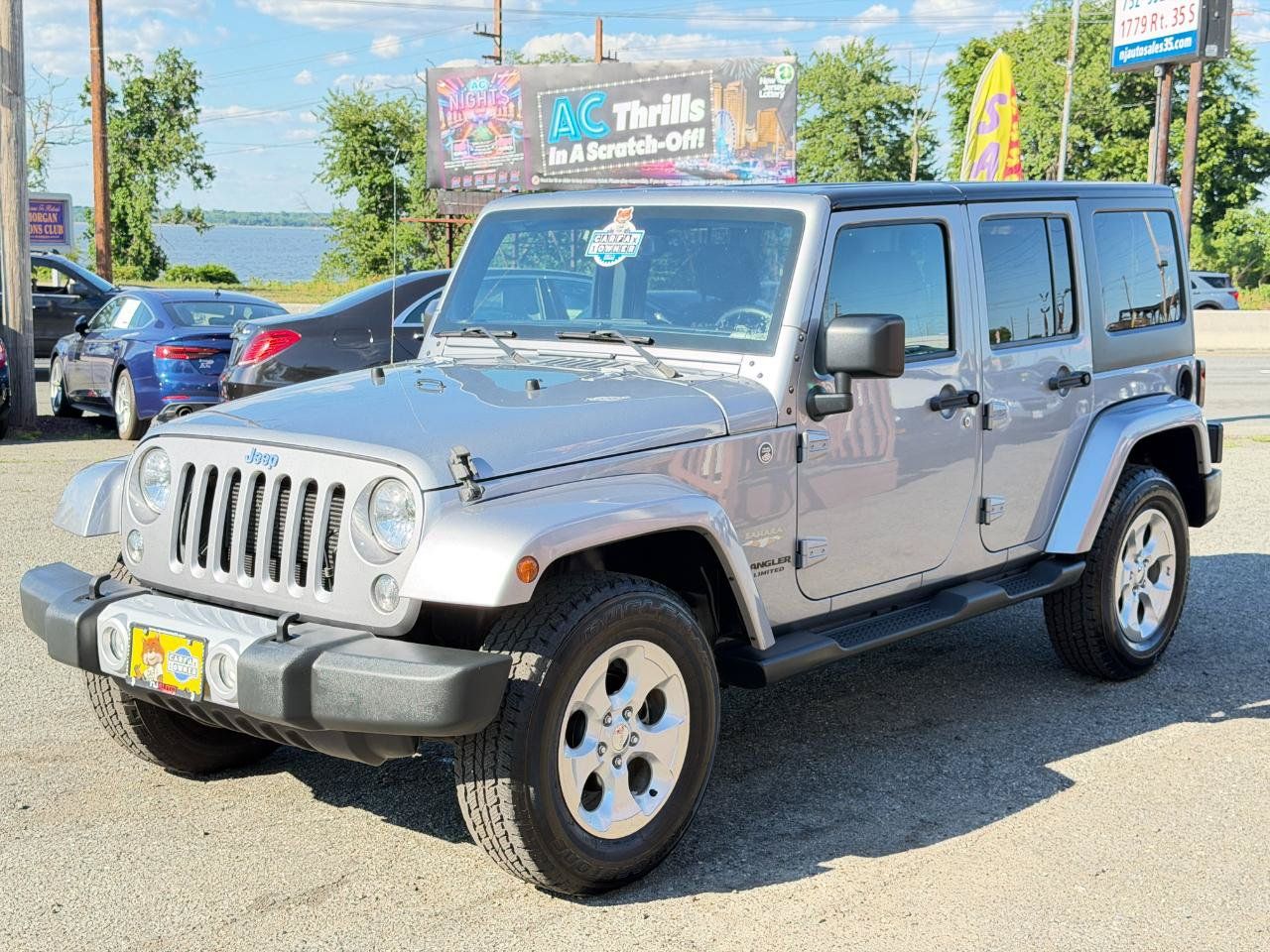 Used 2015 Jeep Wrangler Unlimited Sahara w/ Dual Top Group AWD/4WD image 8