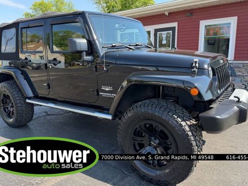 Used 2014 Jeep Wrangler Unlimited Sahara w/ Mopar Chrome Edition Group AWD/4WD image 1