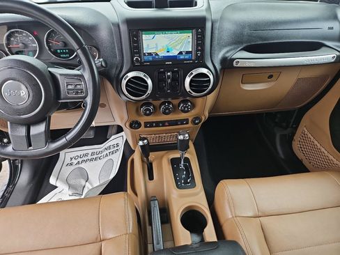 Used 2012 Jeep Wrangler Unlimited Sahara w/ Dual Top Group AWD/4WD image 24
