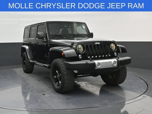 Used 2014 Jeep Wrangler Unlimited Sahara w/ Dual Top Group AWD/4WD image 1