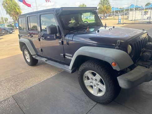 Used 2013 Jeep Wrangler Unlimited Sport AWD/4WD image 1