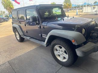 Used 2013 Jeep Wrangler Unlimited Sport AWD/4WD video 1