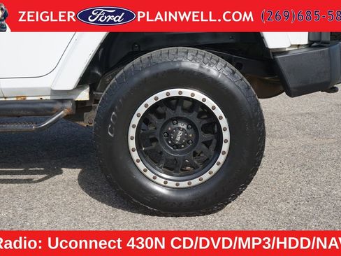 Used 2012 Jeep Wrangler Unlimited Sahara w/ Dual Top Group AWD/4WD image 9