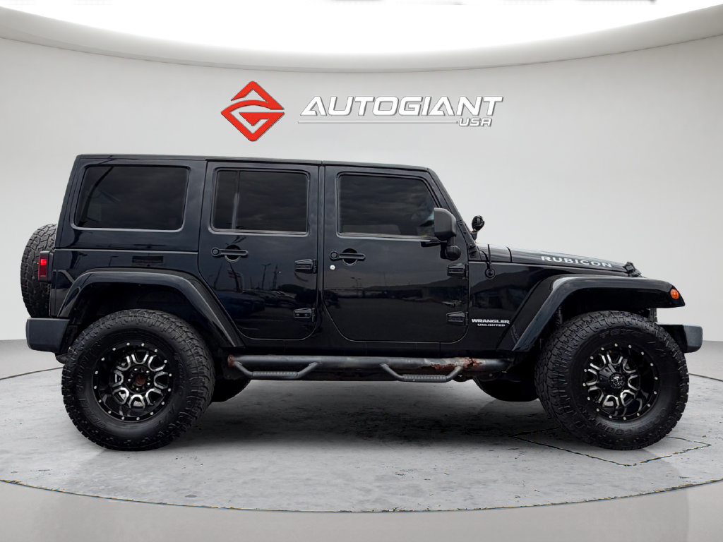 Used 2012 Jeep Wrangler Unlimited Rubicon w/ Dual Top Group AWD/4WD image 10