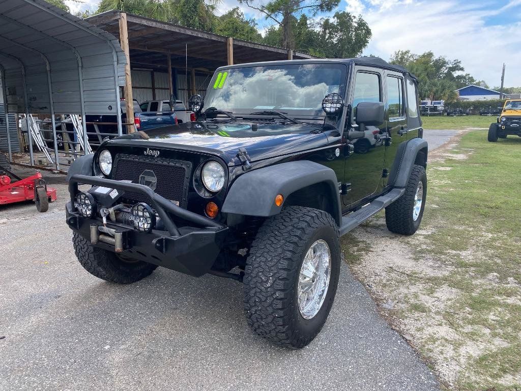 Used 2011 Jeep Wrangler Unlimited Sport w/ Connectivity Group AWD/4WD image 2