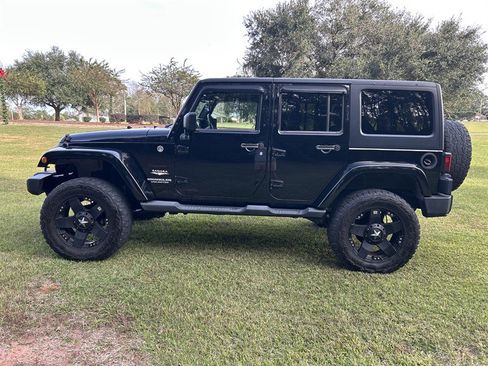 Used 2013 Jeep Wrangler Unlimited Sahara w/ Dual Top Group image 2