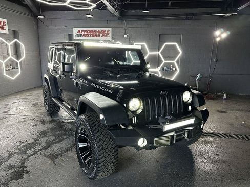 Used 2014 Jeep Wrangler Unlimited Rubicon w/ Connectivity Group AWD/4WD image 11