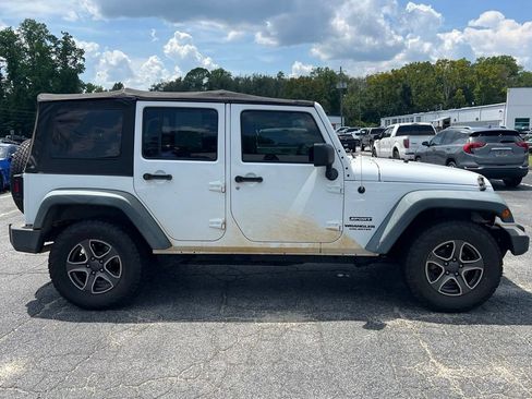 Used 2012 Jeep Wrangler Unlimited Sport AWD/4WD image 2