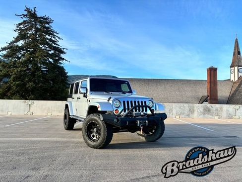 Used 2010 Jeep Wrangler Unlimited Sahara w/ Dual Top Group AWD/4WD image 2