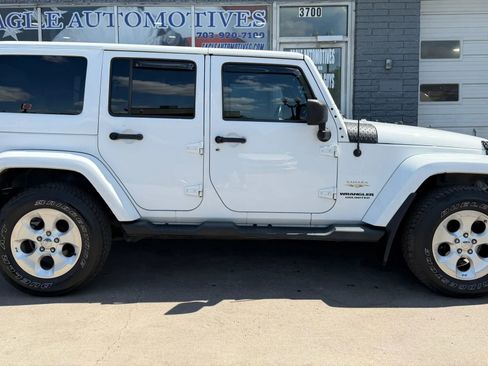 Used 2013 Jeep Wrangler Unlimited Sahara w/ Connectivity Group AWD/4WD image 2