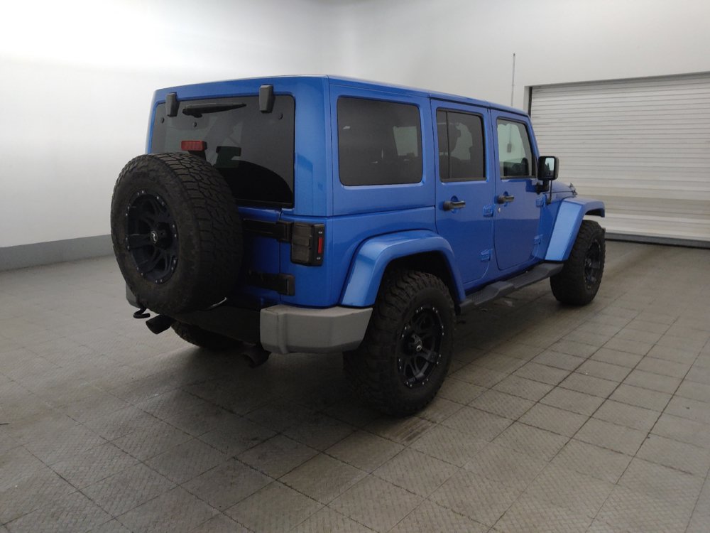 Used 2014 Jeep Wrangler Unlimited Sahara AWD/4WD image 9