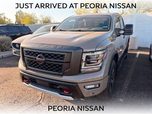 Used 2023 Nissan Titan PRO-4X w/ Pro-4x Utility Package AWD/4WD image 1