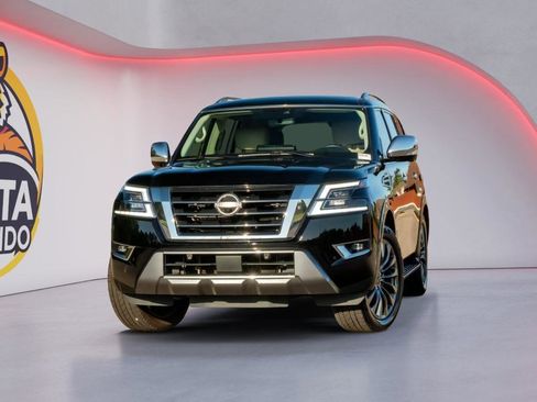 Used 2021 Nissan Armada Platinum w/ Captain's Chairs Package RWD image 1