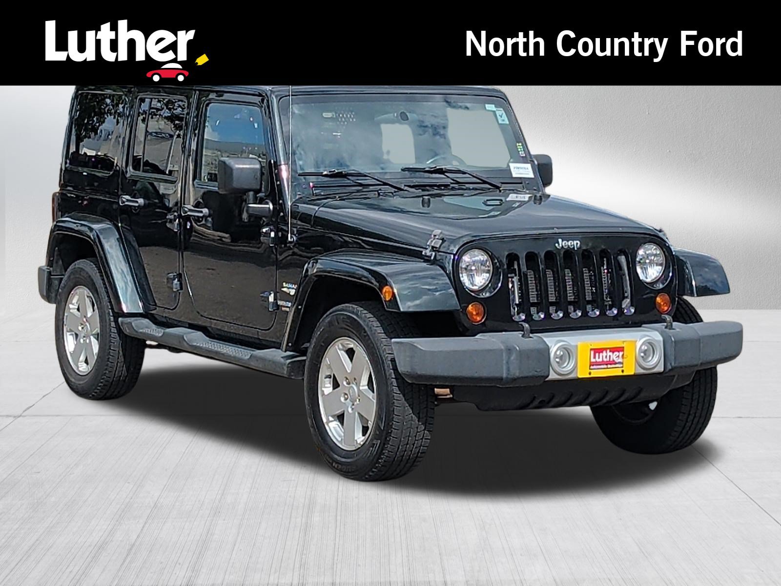 Used 2012 Jeep Wrangler Unlimited Sahara w/ Dual Top Group AWD/4WD image 1