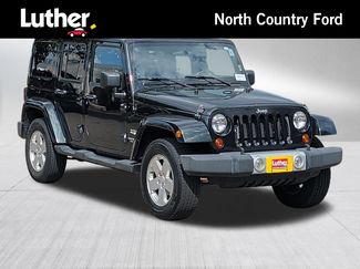 Used 2012 Jeep Wrangler Unlimited Sahara w/ Dual Top Group AWD/4WD video 1