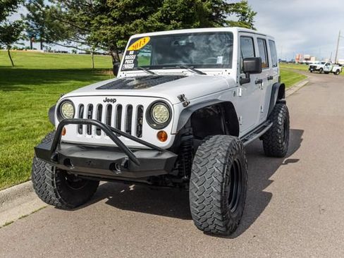 Used 2013 Jeep Wrangler Unlimited Sahara AWD/4WD image 1