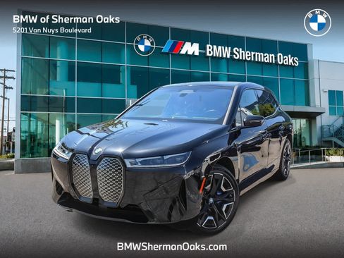 Used 2024 BMW iX xDrive50 w/ Premium Package AWD/4WD image 1