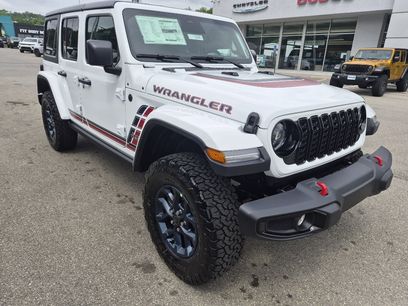 New 2026 Jeep Wrangler Unlimited Sport w/ Dual Top Group