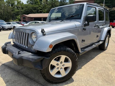 Used 2014 Jeep Wrangler Unlimited Sport AWD/4WD image 1