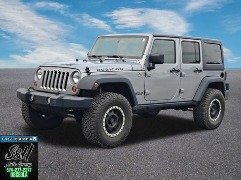 Used 2013 Jeep Wrangler Unlimited Rubicon w/ Dual Top Group AWD/4WD image 12