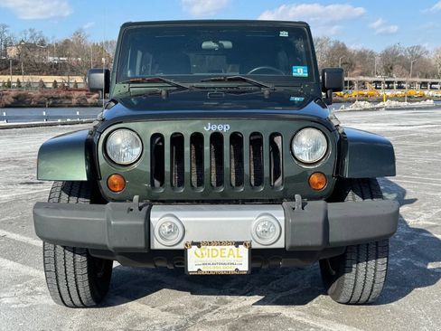 Used 2011 Jeep Wrangler Unlimited Sahara w/ Dual Top Group AWD/4WD image 2
