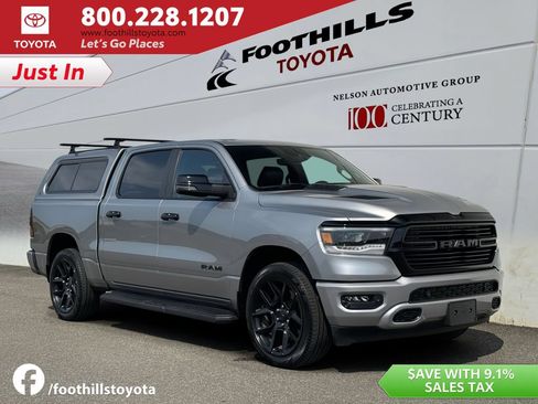 Used 2023 RAM 1500 Laramie AWD/4WD image 1
