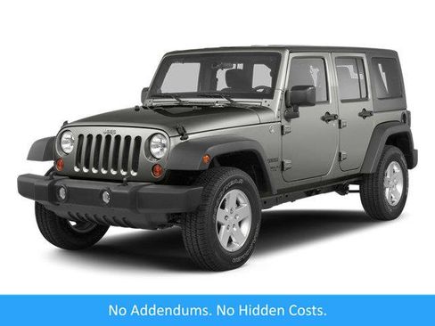 Used 2013 Jeep Wrangler Unlimited Sport AWD/4WD image 1