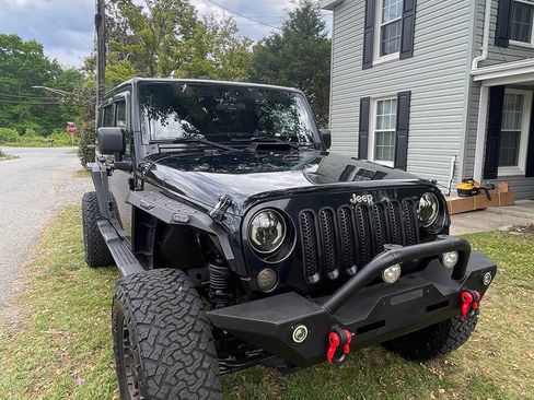 Used 2012 Jeep Wrangler Unlimited Sahara w/ Dual Top Group AWD/4WD image 9