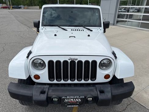 Used 2012 Jeep Wrangler Unlimited Sahara w/ Dual Top Group AWD/4WD image 11